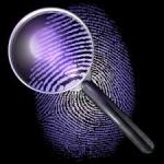 investigazioni private milano - immagine di una lente di ingrandimento che inquadra un impronta digitale